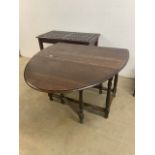 An early 20th century gate leg table also with a side table with carved top and tapered legs.