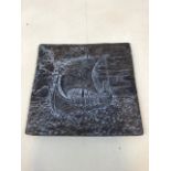 An Arts and Crafts lead plaque depicting a Viking Ship W:30cm x H:30cm