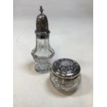 A Chester hall marked silver top sugar caster also with a silver lidded dressing table jar H:19cm