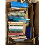 A four boxes of books including reference books on coins, barometers, fossils and others