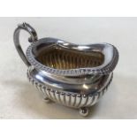A silver hall marked creamer, weight 159gm