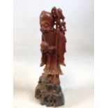 An ornately carved soapstone figure of a Chinese wise man H:23cm