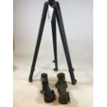 A tripod for a gunsight telescope with two telescopes - one marked Telescope elevation MK2