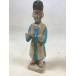 A Chinese pottery figure, possibly Tang Dynasty H:28cm
