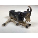 A painted wooden vintage articulated goat. a/F W:19cm x H:18cm