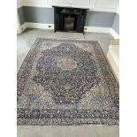 Very large Blue Ground Rug with very fine floral pattern, surrounding a central lozenge : Kirman