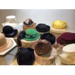A quantity of mid century and later ladies hats with hat boxes