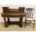 A Late 19th early 20th century ladies writing desk with leather top with large storage compartment