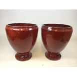 A pair of glazed terracotta planters W:37cm x H:47cm