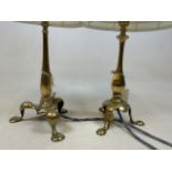 Two 19th century brass Pullman lamps.