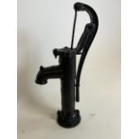 A wrought iron water pump H:65cm
