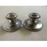 A pair of Norwegian short candle stands marked 830s.