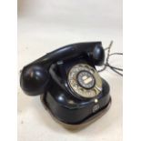 A mid century bakelite telephone with FTR logo on front. A/f untested. Later mounted on swivel