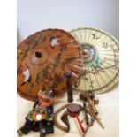 Two hand painted paper parasols, a puppet, reticulated wooden python and other it ed