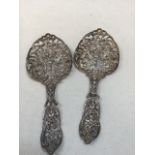 A pair of ornamental silver hallmarked spoons 119 gm, Sheffield JR 1898