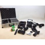 An aluminium case full of Minolta items. Two Minolta SLR cameras models 7000 and 9000. Also with a
