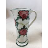 A Wemyss style tall jug - stamped to base with retailer name Holroyd Barker, Oxford Street. Hair
