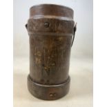 A Leather shot bucket. With B.H & GL Ltd 1940 pressed into base. H:39cm