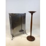 A chrome early 20th century fire screen also with an floor standing ashtray with copper insert -