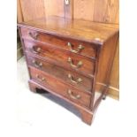 A Victorian small mahogany chest of four drawers with brass handles. W:85cm x D:46.5cm x H:84cm