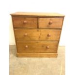 An antique pine chest of drawers with two short over two long drawers. W:89cm x D:47cm x H:88cm