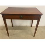 A small side table with large drawer on tapered legs. W:81cm x D:50cm x H:73cm