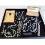 A quantity of vintage costume jewellery and boxes
