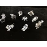 A collection of 9 Swarovski Silver crystal animals including snail, giraffe, lamb, tortoise, fish,