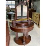 A 20th century mahogany Demi lune dressing table with swing mirror, lift up lid to storage and small