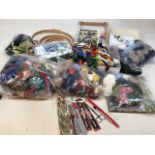 A large quantity of tapestry wool and embroidery yarn also with tapestry frames and knitting