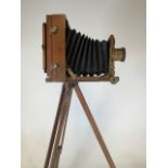 A Lancaster and Son Birmingham 1891 instantograph patent camera on tri pod stand. Lens marked J
