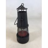 A vintage iron miners lamp W:15cm x H:35cm