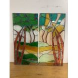 A pair of stained glass panels W:52cm x H:108.5cm