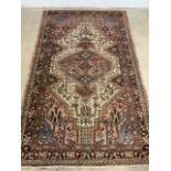A large Hamadan rug. W:140cm x H:235cm