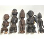 A selectipn of Primitive tribal fertility wooden carved figures, Fang and other African tribes. H: