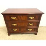 A good quality Reproduction mahogany chest of drawers by Charlieâ€™s Barr with cross banded top with