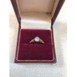 A gold illusion set diamond ring, marked 22 14. Hallmarks worn. Size P. Total weight 2 gm. Box not