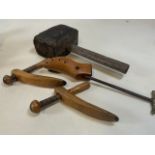 Vintage shoe stretcher also with a very large wooden mallet.