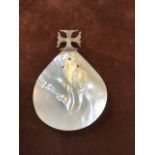 A silver mounted mother of pearl baptismal spoon W:8cm x H:12cm