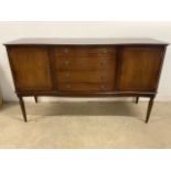 A serpentine regency style sideboard, with cutlery drawer and cross bandied top. W:145cm x D:48cm