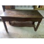 A late 19th century bobbin turned low table. W:121cm x D:51cm x H:69cm