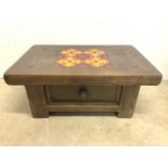 A modern coffee table with drawer, wooden painted tile effect to top. W:100cm x D:65cm x H:43cm