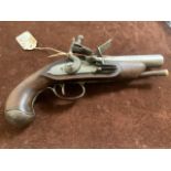 A Continental traveling flintlock pistol C. 1760-80. Oak handled with steel barrel. From private