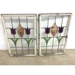 A pair of 1930s stained glass tulip leaded windows, in metal crittle frames. (a.f crack to glass see