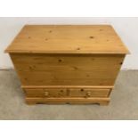 A modern solid pine chest with two drawers to base. Brass handles to the sides. W:84cm x D:47cm x