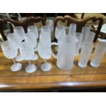 An opaque glass lemonade set. Jug, straight lemonade glasses (5) goblets (10) also with a pair of