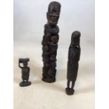 A carved Tree of life figurine and 2 other figures H:38cm Tree of life figure