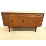 A mid century small sideboard with G Plan label also a label for Times furnishing, with double