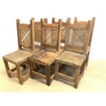 A set of six rustic, lattice backed chairs with hide seats.