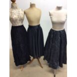 A quantity of vintage evening skirts also with a range of ladies vintage jackets see photos